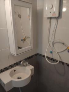 Bilik mandi di Sainam Holiday Home