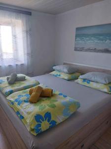 Postel nebo postele na pokoji v ubytování Apartments in Klanice/Insel Krk 14692