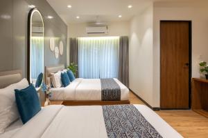 The Zuree Hotel客房内的一张或多张床位