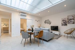 Et tv og/eller underholdning på Loft DYANE - Le Méridien #Parking #Lave-linge #Clim #Netflix + 37 billeder