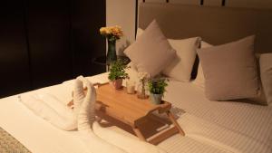 Postel nebo postele na pokoji v ubytování Axon Residence KLCC - LM HOME