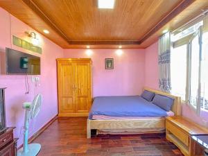 Postel nebo postele na pokoji v ubytování Yumie house