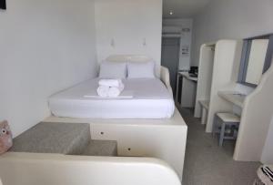 A bed or beds in a room at Villa Panorama