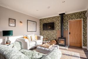 Televiisor ja/või meelelahutuskeskus majutusasutuses The Stables