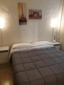A bed or beds in a room at Affittacamere Euro