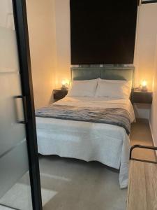 Ένα ή περισσότερα κρεβάτια σε δωμάτιο στο Beautiful Rooms Nº1