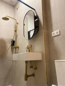 Ένα μπάνιο στο Beautiful Rooms Nº1