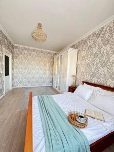 Ένα ή περισσότερα κρεβάτια σε δωμάτιο στο Сарыарка, 31
