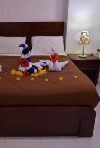 Postel nebo postele na pokoji v ubytování Fox Hotel El Ahyaa + 3 fotografie