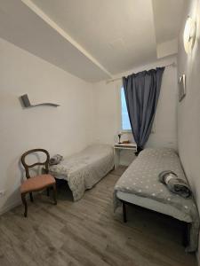 Katil atau katil-katil dalam bilik di La Casina