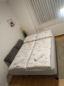 Postel nebo postele na pokoji v ubytování FIOLICA
