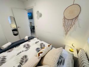 En eller flere senge i et værelse på El Teatro del Pilar