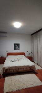 Postel nebo postele na pokoji v ubytování Casa Alice, in collina con panorama