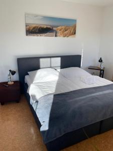 Postel nebo postele na pokoji v ubytování Ferienoberwohnung in Villa Pesca