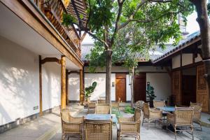 Patio nebo venkovní prostory v ubytování Ancient Charm Inn Chengdu