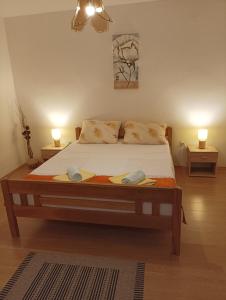Postel nebo postele na pokoji v ubytování Apartment Dunja