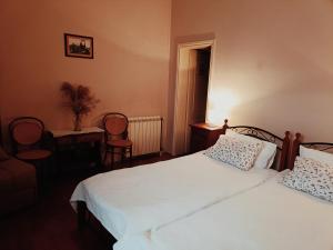 Voodi või voodid majutusasutuse Šomin lagum - Guest house toas