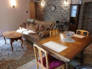 a living room with a table and a couch at Parlament in Tallinn