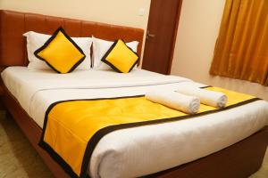Postel nebo postele na pokoji v ubytování UJ Pallazzio - Business Class Luxury Hotel