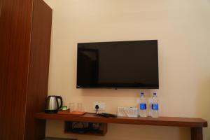 TV a/nebo společenská místnost v ubytování UJ Pallazzio - Business Class Luxury Hotel