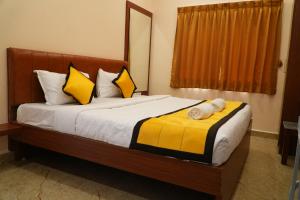 Postel nebo postele na pokoji v ubytování UJ Pallazzio - Business Class Luxury Hotel