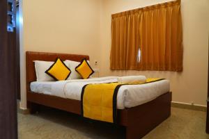 Postel nebo postele na pokoji v ubytování UJ Pallazzio - Business Class Luxury Hotel