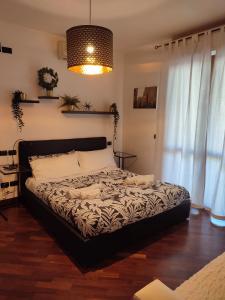 Postel nebo postele na pokoji v ubytování Leonardo Rome Holidays