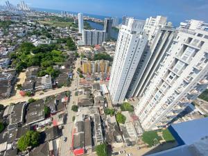 an aerial view of a city with tall buildings at Vista panoramica al Mar y Piscina in Cartagena de Indias