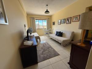 Posezení v ubytování Apartamento 1 quarto Aconchegante em Águas de Lindóia