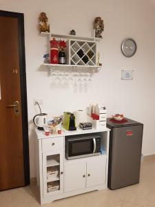 Kuchyň nebo kuchyňský kout v ubytování B&B Galateo