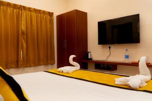 TV a/nebo společenská místnost v ubytování UJ Pallazzio - Business Class Luxury Hotel + 37 fotografií