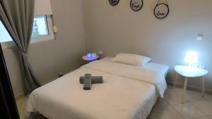 Ένα ή περισσότερα κρεβάτια σε δωμάτιο στο M&G comfort home