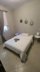 Ένα ή περισσότερα κρεβάτια σε δωμάτιο στο M&G comfort home