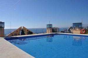 a large swimming pool on top of a building at 3D MTR - Marbella Temporary Rent Two Bedrooms Apartment Marbella Old Town in Marbella