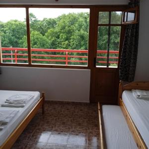 Postel nebo postele na pokoji v ubytování Villa Victoria