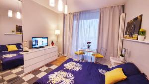 Posteľ alebo postele v izbe v ubytovaní HomeComfort Apartament Adonis