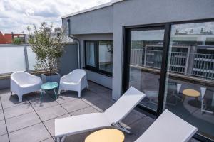 Balkón nebo terasa v ubytování Rewindhotel