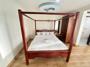 Afbeelding uit fotogalerij van Maanet Gardens Hotel in Kutu