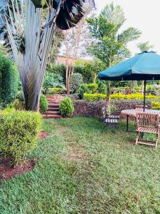 Afbeelding uit fotogalerij van Maanet Gardens Hotel in Kutu