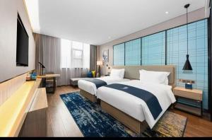 Fotografie z fotogalerie ubytování Echarm Hotel Wuhan Jiefang Park Zhaojiajiao Metro Station v destinaci Wu-chan