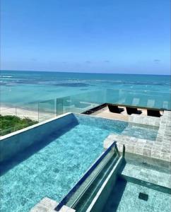 Bazén v ubytování Apartamento em Maceió Prédio Luxo Beira Mar NT 322 nebo v jeho okolí