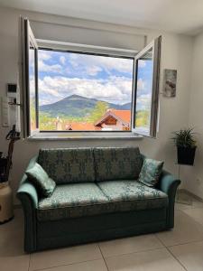 Nespecifikovaný výhled na hory nebo výhled na hory při pohledu z apartmánu