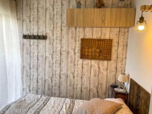 Postel nebo postele na pokoji v ubytování Appartement spacieux avec Jardin à 500 des plages