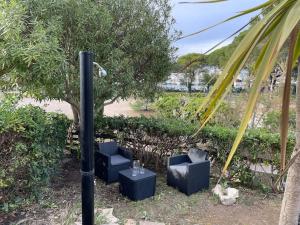 Zahrada ubytování Appartement spacieux avec Jardin à 500 des plages