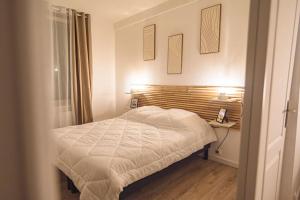 Postel nebo postele na pokoji v ubytování La Suite Fontaine
