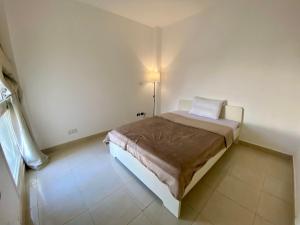 Ένα ή περισσότερα κρεβάτια σε δωμάτιο στο Garden Home with Free Wifi in Modern Cairo