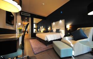 The Abdali Boulevard Hotel客房内的一张或多张床位
