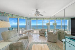 a living room with a view of the ocean at SeaSpray West 603- Gulf Front in Perdido Key