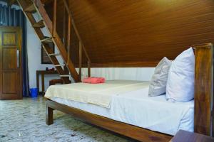 Letto o letti in una camera di Sigiri Sky Home & TreeHouse