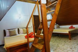 Letto o letti in una camera di Sigiri Sky Home & TreeHouse